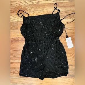 Women size Medium Black Sequence romper